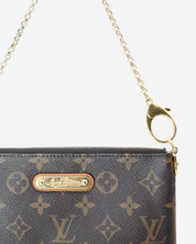 Bolso Louis Vuitton Pochette Milla Monogram 2013