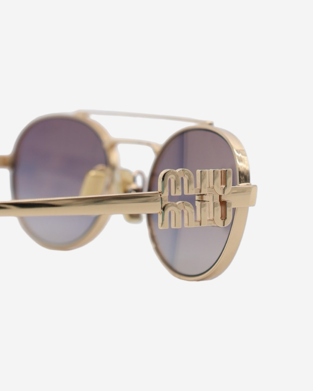 Miu Miu Oval Sunglasses