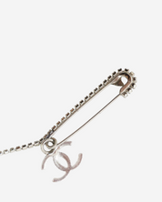 Broche Chanel Doble Seguro