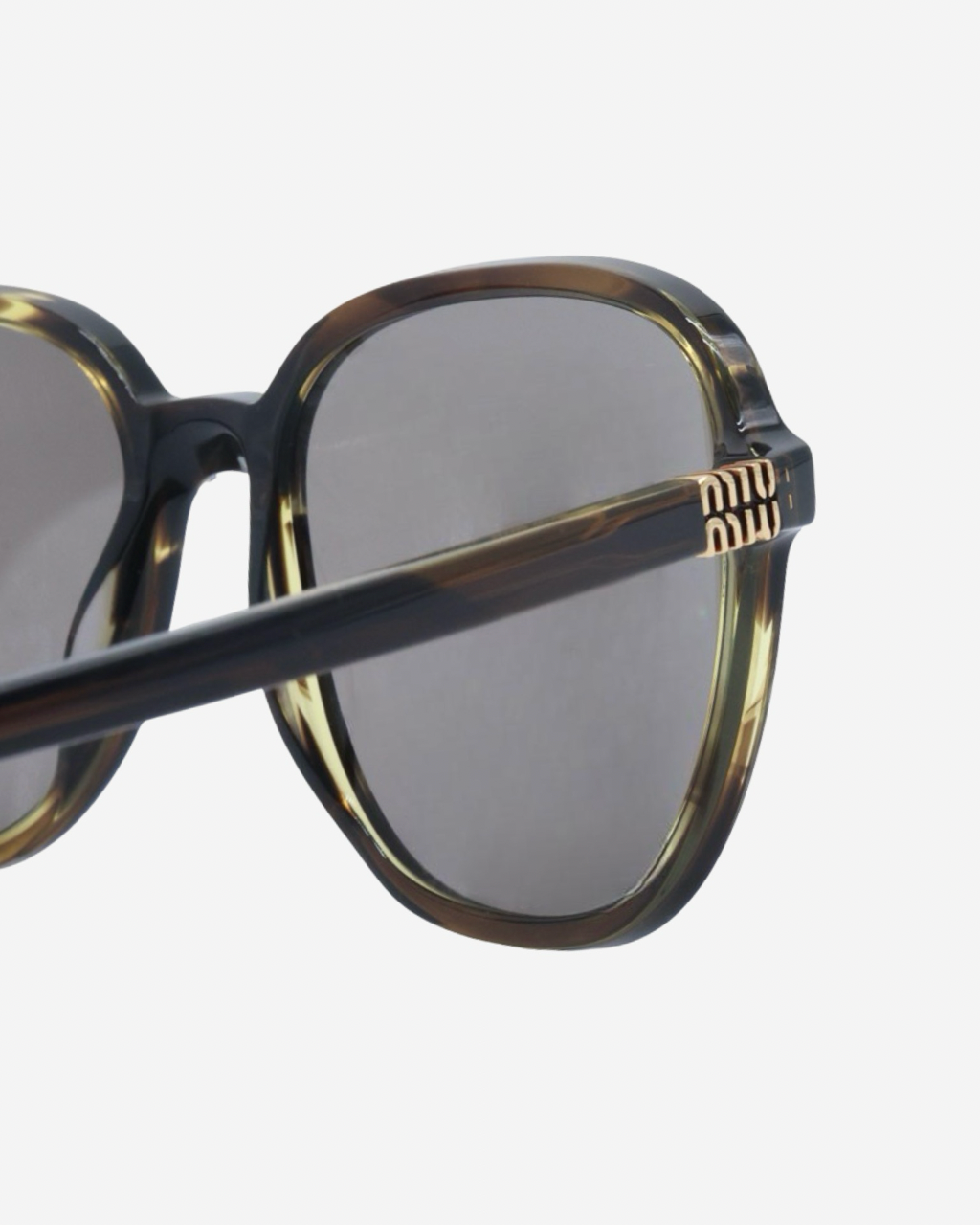 Lentes de Sol Miu Miu Redondos