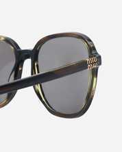 Lentes de Sol Miu Miu Redondos