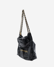 Bolsa Chanel 22 Lambskin