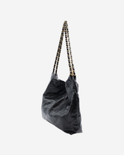 Bolsa Chanel 22 Lambskin